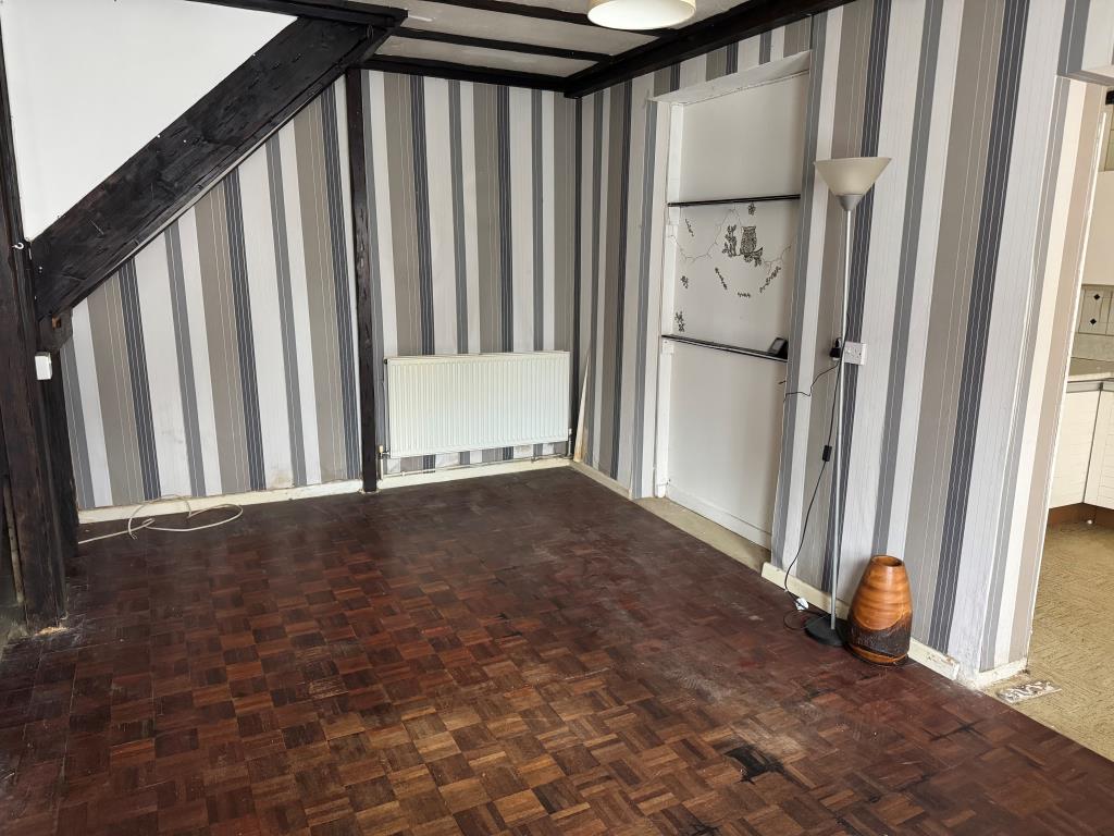 Lot: 118 - THREE-BEDROOM HOUSE FOR IMPROVEMENT - A Reverse View of the Dining Room